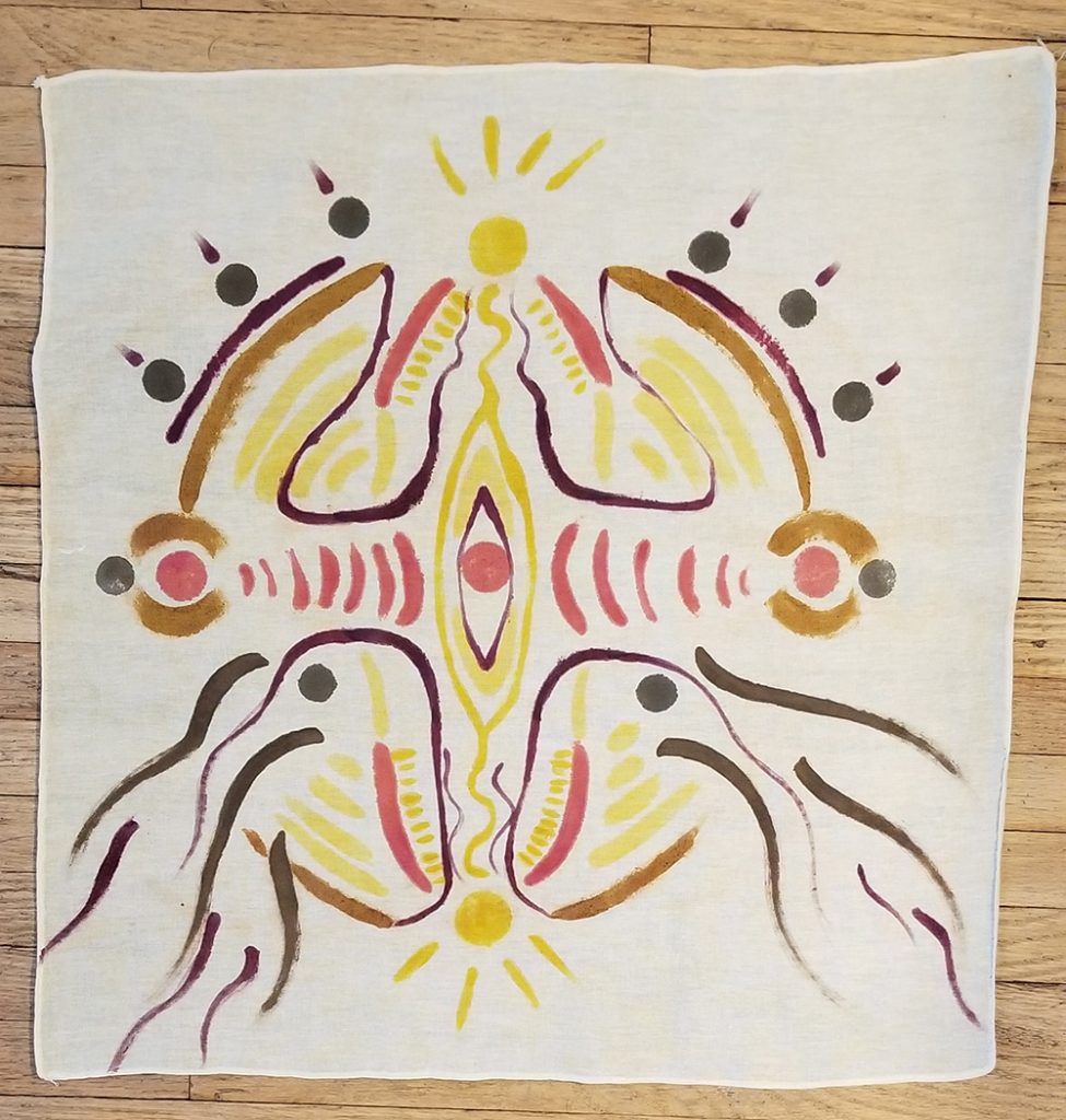natural dyes painted on a cotton bandanna